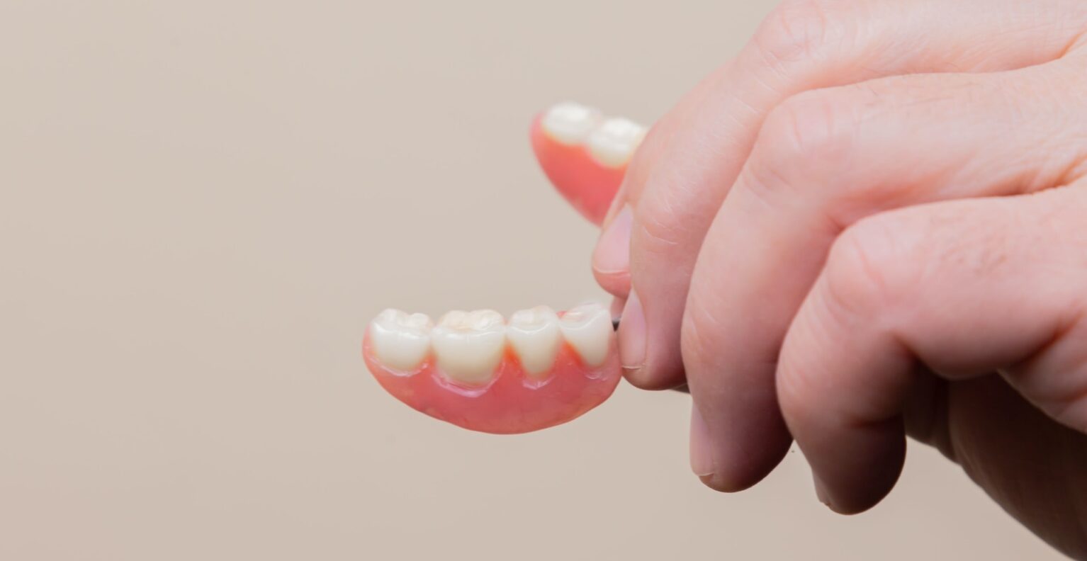 holding dentures in place